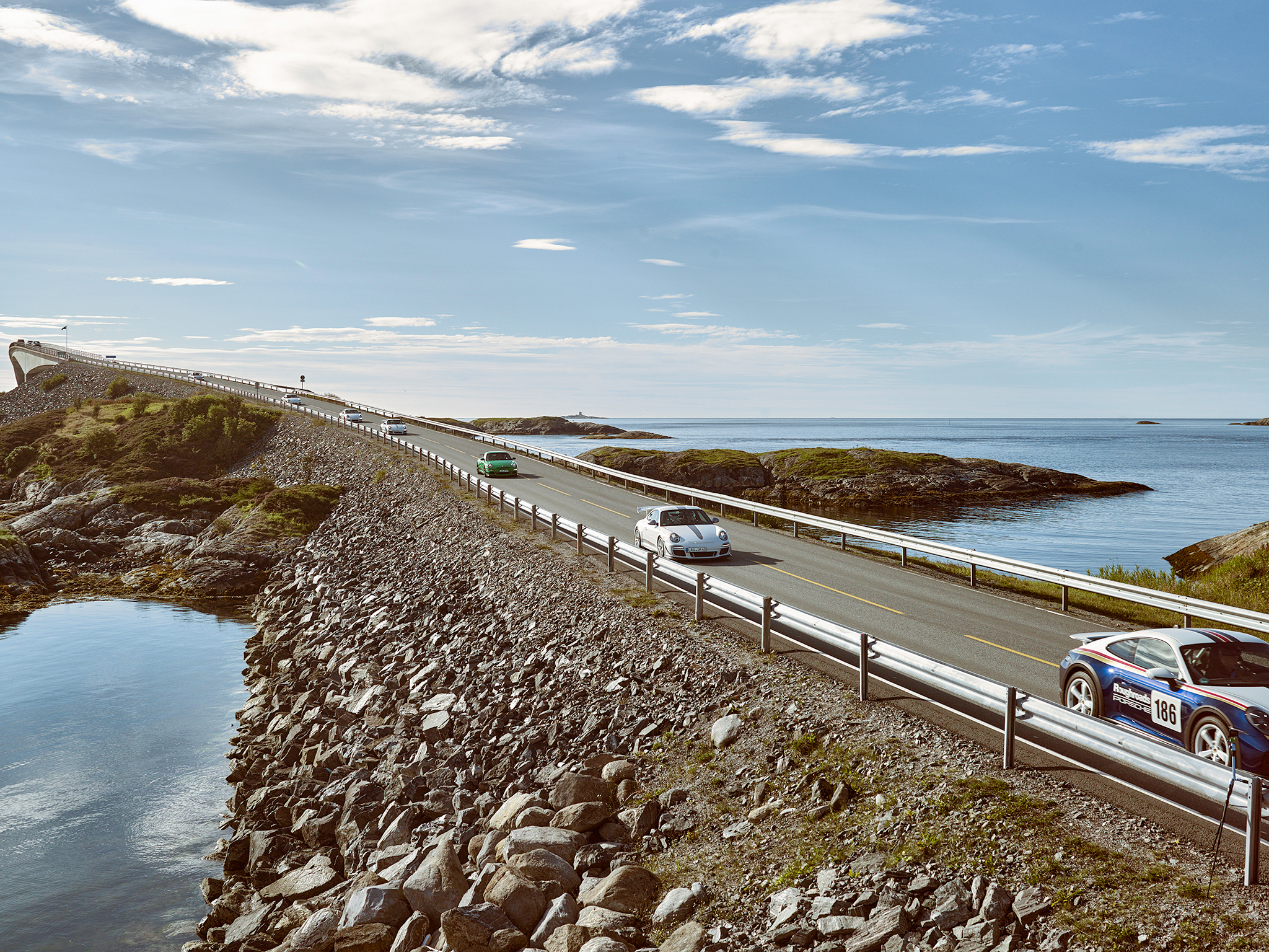 Jan Koum and his convoy of exclusive Porches at Atlantic Road and Trollstigen.